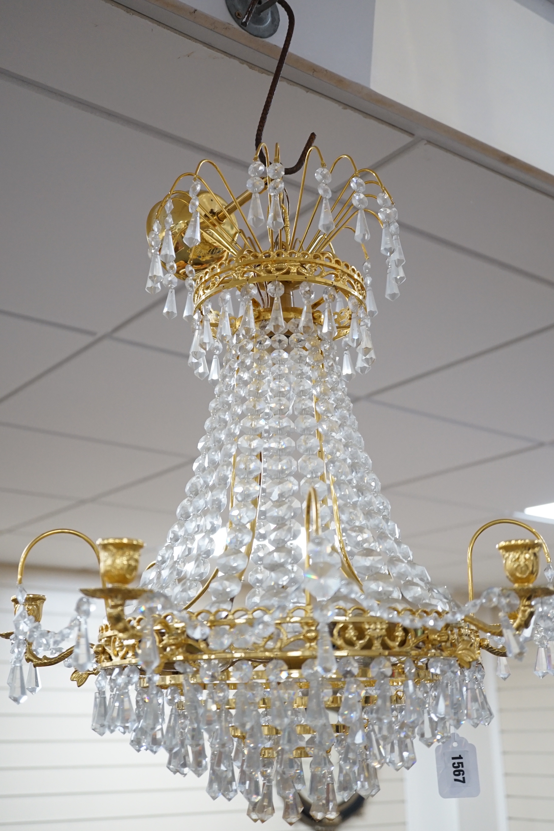 A brass and glass drop three tier chandelier, light approximately 53cm high (not including chain)